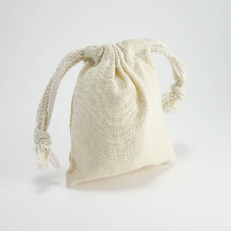 small full canvas bag with ties, Reusable eco bag. Empty small cotton bag  with string on white background. 20453999 Stock Photo at Vecteezy